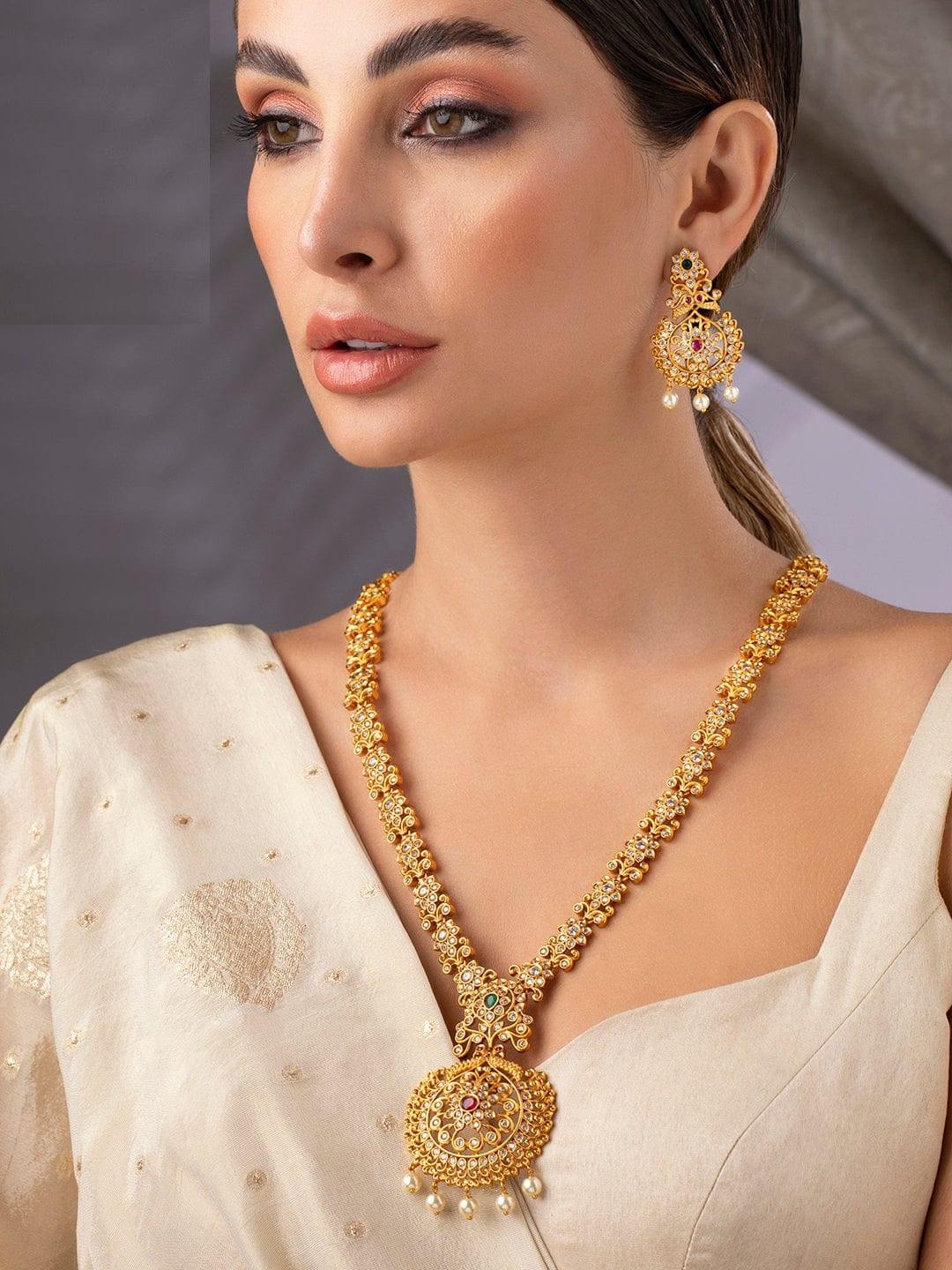 Gold-Toned Stone-Studded Handcrafted Jewellery Set